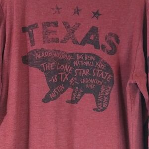 Long sleeve Texas shirt p2p is 22" shoulder to hem is 23" burgundy in color.